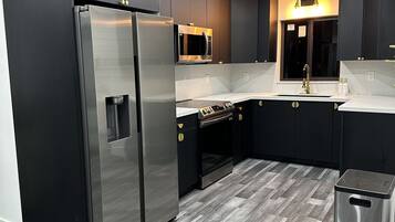 Fridge, oven, coffee/tea maker, toaster