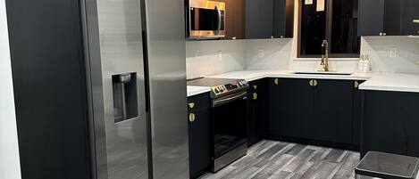 Fridge, oven, coffee/tea maker, toaster