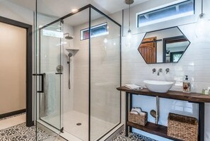 Shower, hair dryer, towels, soap