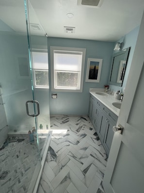 Shower, hair dryer, soap, shampoo