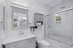 Hair dryer, towels, soap, shampoo