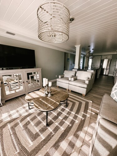 Upscale 1st Floor Beachfront Condo just seconds from the beach and pool