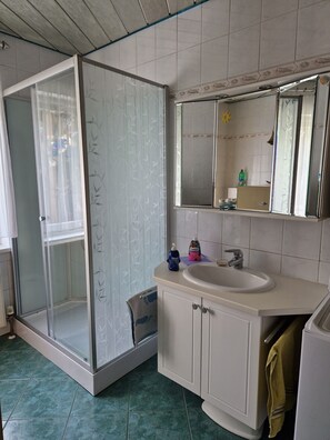 Hair dryer, towels, soap, shampoo