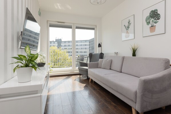 Apartemen, 1 kamar tidur, balkon | Ruang keluarga