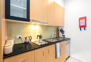 Microwave, stovetop, dishwasher, coffee/tea maker