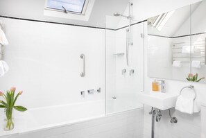 Shower, hair dryer, towels, soap
