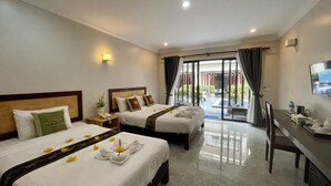 Premium bedding, pillow-top beds, desk, free WiFi
