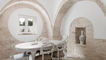 Villa | Living area | 35-inch TV with digital channels