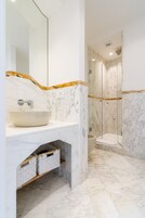 Deluxe Quadruple Room | Premium bedding, minibar, in-room safe, desk