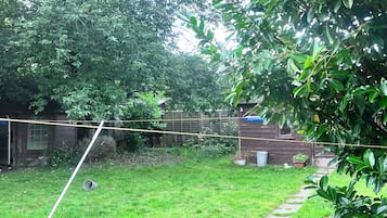Family Quadruple Room, Multiple Beds, Bathtub, Ground Floor | Garden view