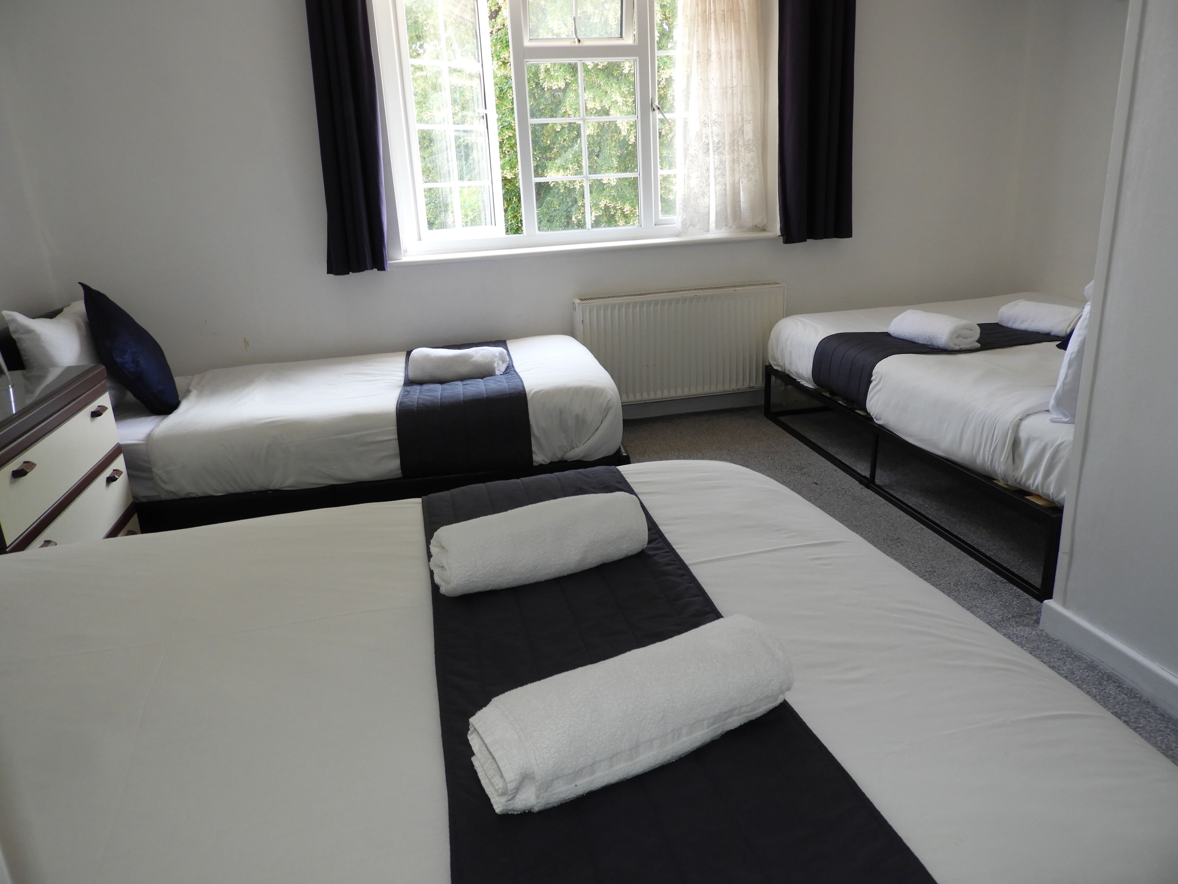 Deluxe Quadruple Room, Multiple Beds | Iron/ironing board, free WiFi
