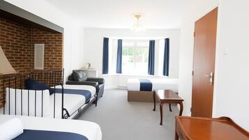Family Quadruple Room, Multiple Beds, Bathtub, Ground Floor | Iron/ironing board, free WiFi