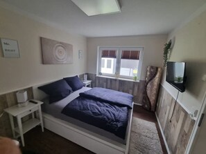 1 dormitorio, cuna de viaje, wifi gratis y ropa de cama