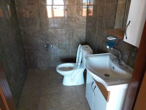 Shower, free toiletries, hair dryer, towels