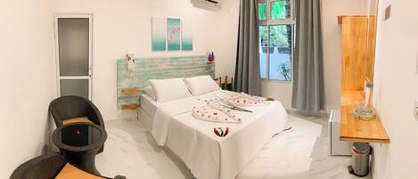 Chambre Double Deluxe | Minibar, coffres-forts dans les chambres, bureau