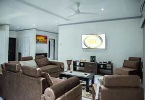 72-inch flat-screen TV with cable channels, TV, streaming services