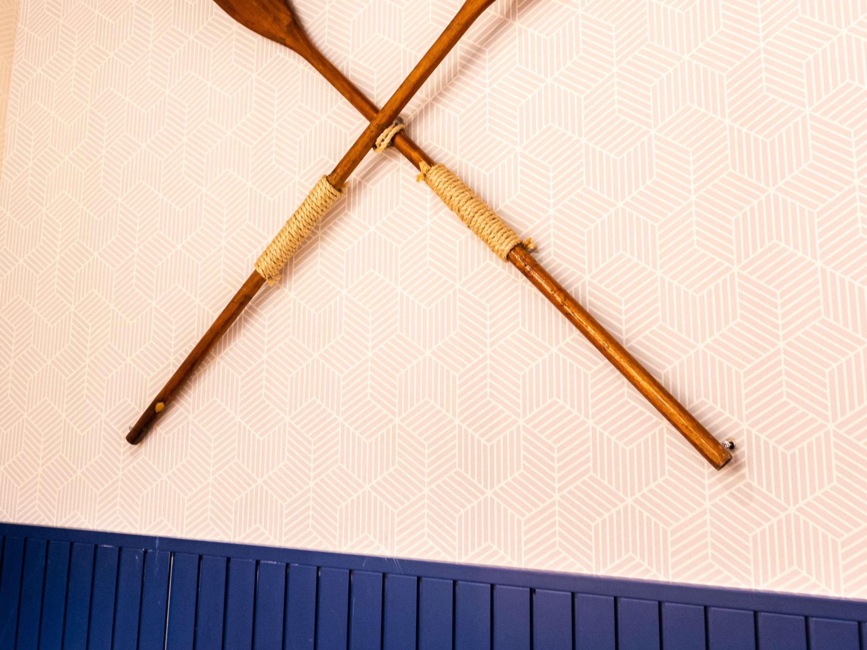 A patterned wall with a geometric design.