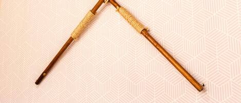 A patterned wall with a geometric design.