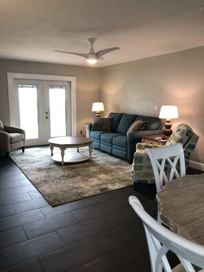 Living area - Oceanfront home, 1800 sq ft, backyard meets the beach, long term rental only (Ormond Beach)