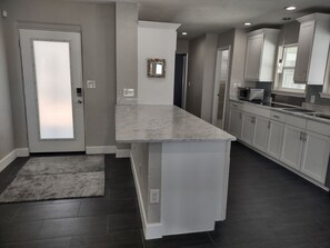 Private kitchen - Oceanfront home, 1800 sq ft, backyard meets the beach, long term rental only (Ormond Beach)