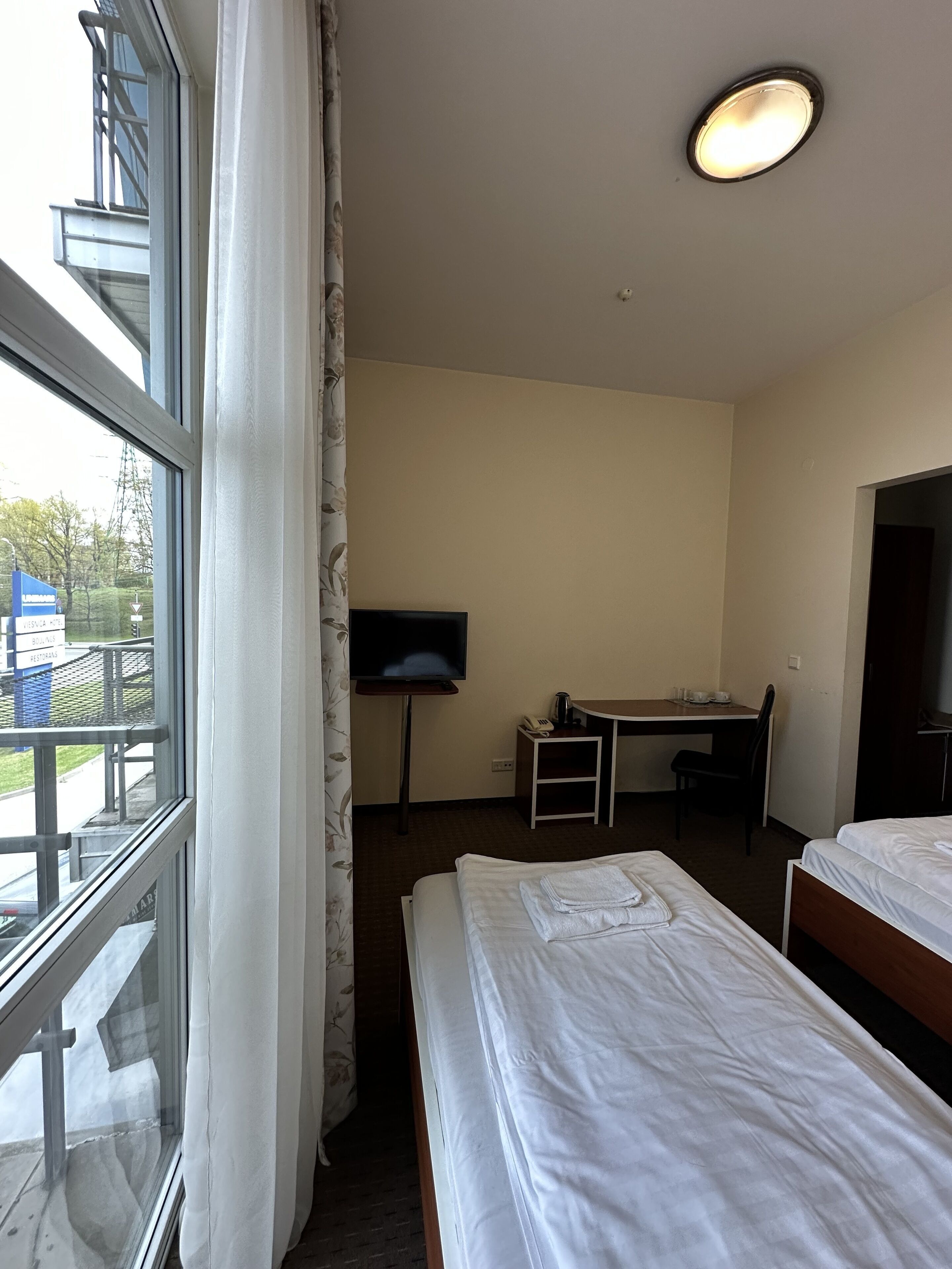 Desk, laptop workspace, free WiFi, bed sheets