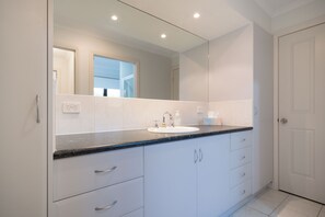 Bathtub, hair dryer, towels