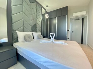 1 bedroom, desk, iron/ironing board, travel cot