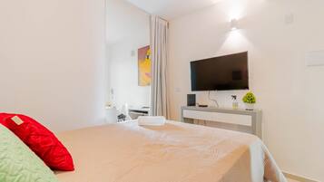 Departamento | 1 habitación, cortinas blackout y tabla de planchar con plancha