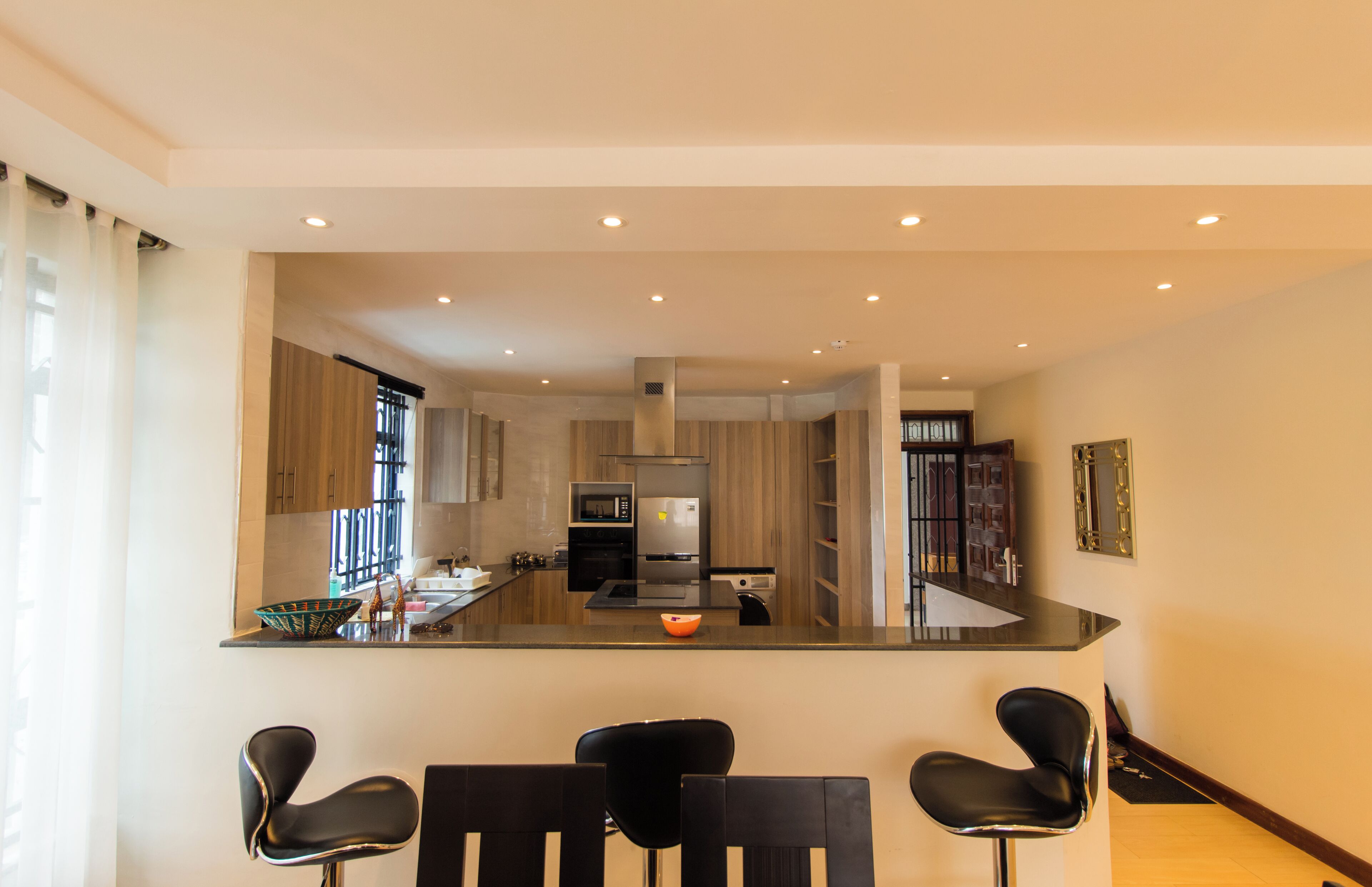 Apartamento executivo, 3 quartos | Cozinha privada | Geladeira grande, micro-ondas, fogão, cooktop