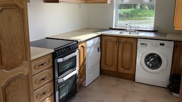 Apartment, Multiple Beds | Private kitchen | Fridge, electric kettle, highchair
