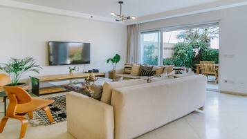 Apartment | Living area | 43-inch flat-screen TV with digital channels, TV, Netflix