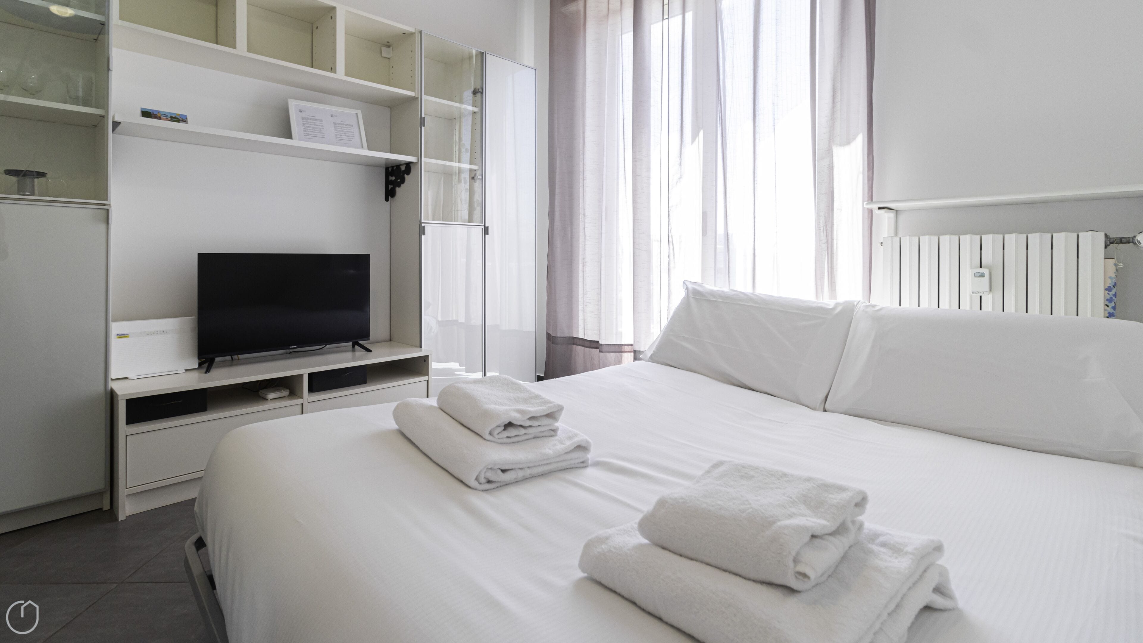 Lägenhet (1 Bedroom) | 1 sovrum, skrivbord, strykjärn/strykbräda och barnsängar