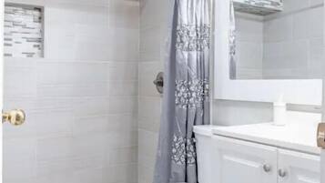 Hair dryer, towels, soap, shampoo