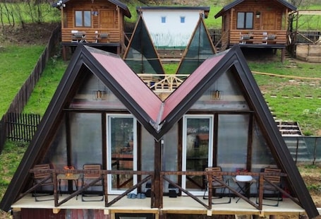 Exterior. Red bungalow Bosnian pyramid glamping