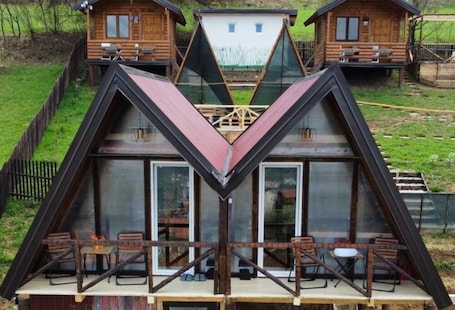 Exterior. Orange bungalow Bosnian pyramid glamping