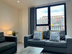 Apartamento, 1 cama de matrimonio con sofá cama | Zona de estar