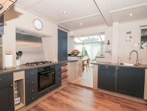Fridge, dishwasher, cookware/dishes/utensils