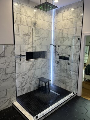 Shower, hair dryer, towels, soap