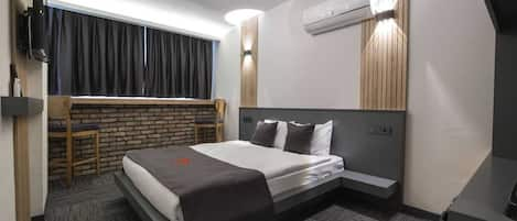 Standard Room | Premium bedding, desk, laptop workspace, blackout curtains