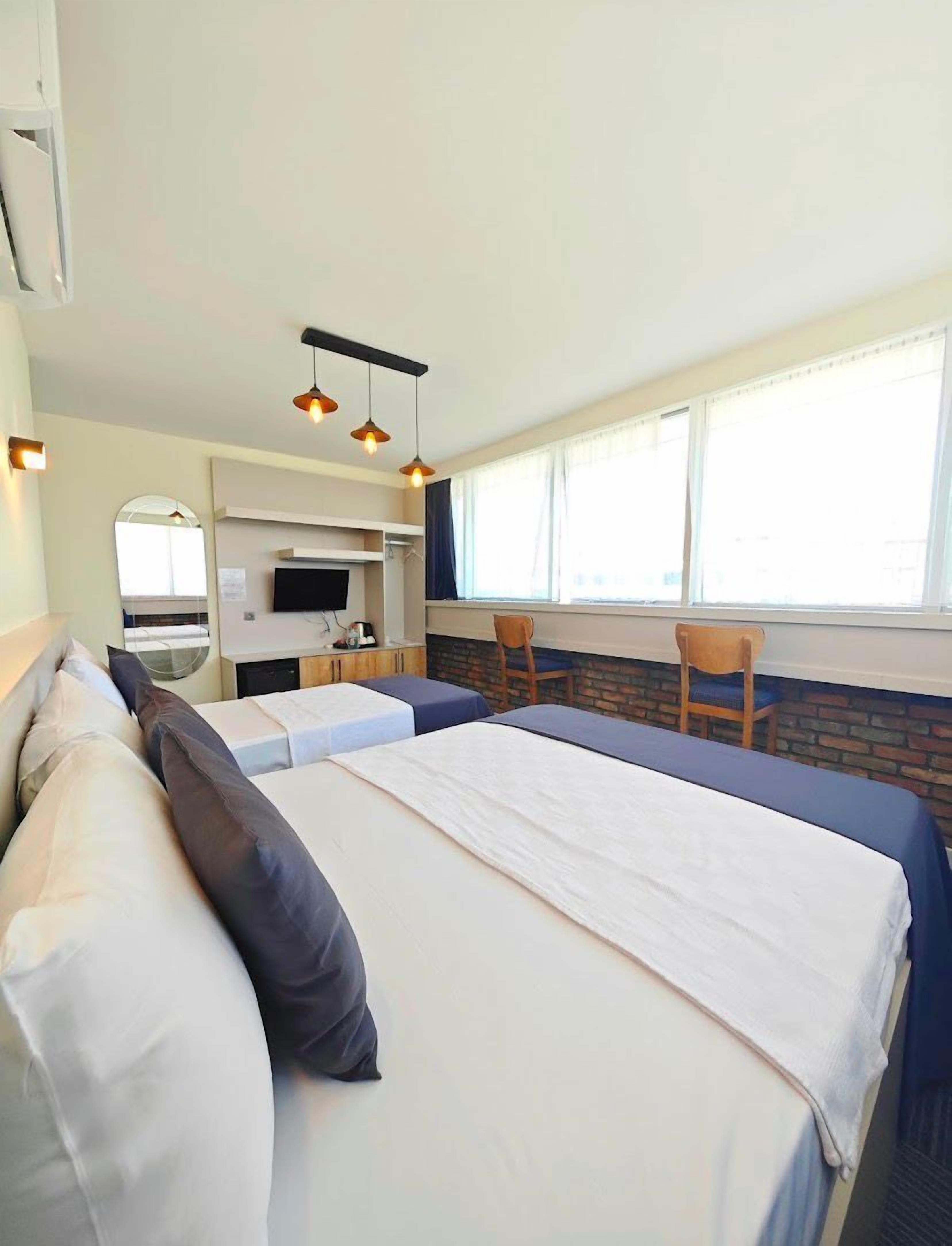 Standard Room | Living area | 30-inch LED TV with premium TV channels, TV, computer monitors