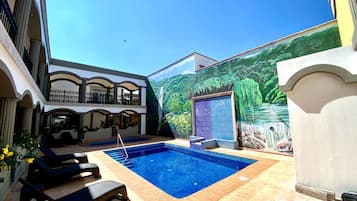 Standaard kamer | Zwembad | Een buitenzwembad