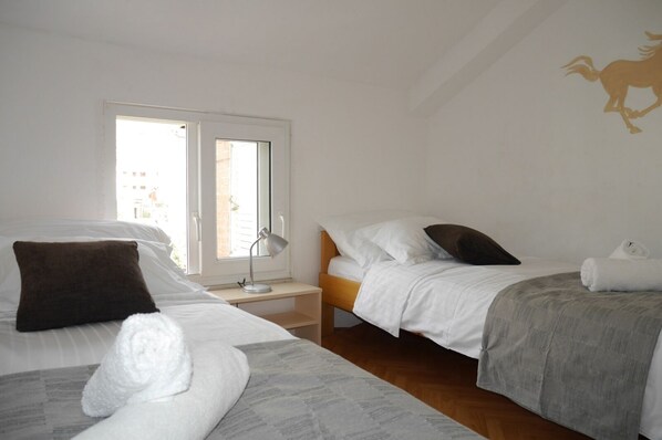 2 chambres, accès au Wi-Fi (inclus), literie fournie