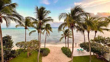 On the beach, sun loungers, beach towels