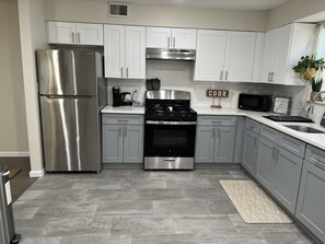Private kitchen - Home away from away. Beautifully decorated 3 king bed with 2 bath. Downtown NJ (Newark)