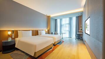 Premium bedding, down duvets, in-room safe, desk