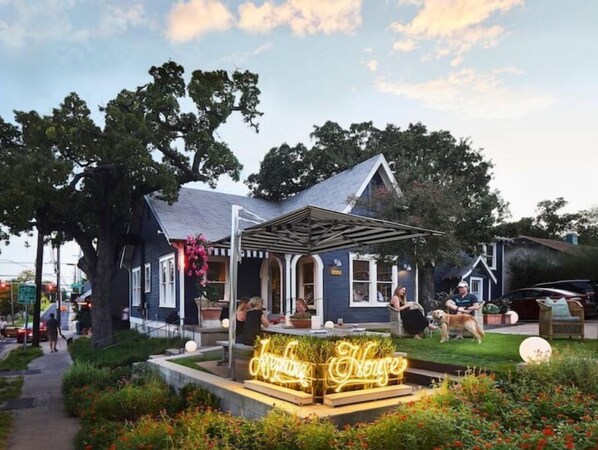 Experience the charm of this traditional two-story building, surrounded by lush gardens and a tranquil atmosphere.