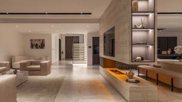 Exclusive Villa, 5 Bedrooms, Private Pool, Beachfront | Living area | 75-inch LED TV with satellite channels, TV, fireplace