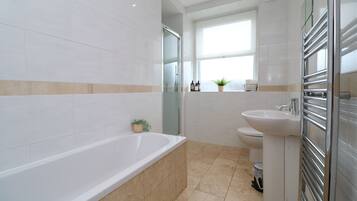 Hair dryer, towels, soap, shampoo