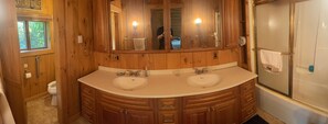 Shower, towels, soap, toilet paper