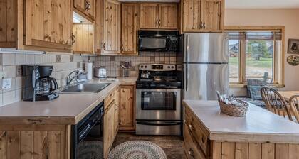 Rustic but comfortable mountain cabin with large porch and gorgeous scenery.